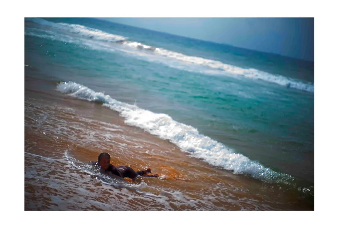 Ghana Love 1 — mavis in water aflao beach 13x19 ghana love